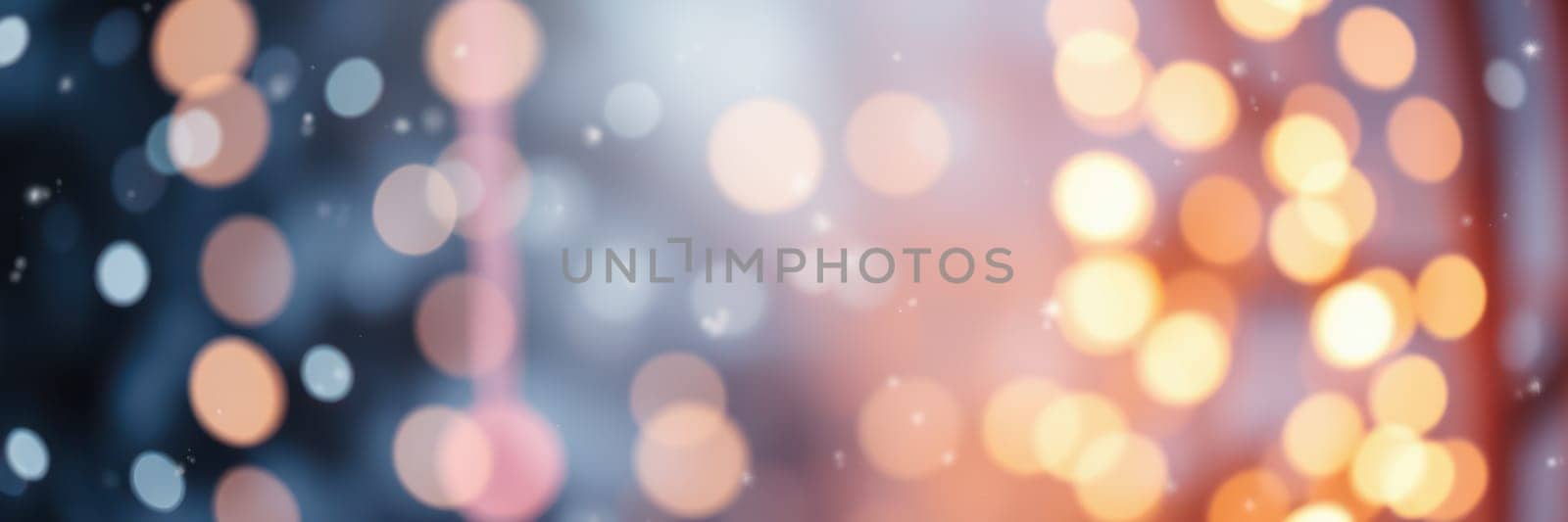Colorful bokeh lights shimmer softly, creating a magical atmosphere during a winter evening celebration. The blurred effect adds warmth to the cool night.