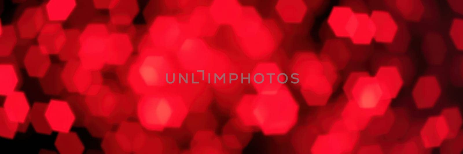 A multitude of bright red lights forms a beautiful bokeh effect. This visually striking display enhances the ambiance of nighttime events and celebrations, creating an enchanting mood.