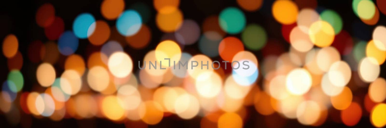 Bright, colorful lights twinkle in various hues, creating a lively ambiance at an evening festival. The blurred backdrop enhances the festive spirit, inviting joy and celebration.