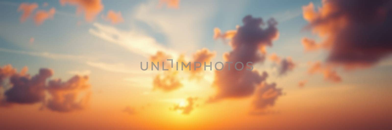 A stunning display of a sunset with warm hues filling the sky, clouds drifting gently as the sun casts vibrant rays over the tranquil scenery. This moment captures nature's beauty.