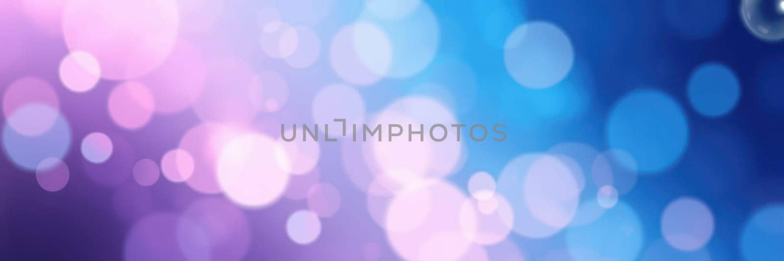 Soft, blurred circular lights in shades of purple and blue provide a dreamy and whimsical backdrop perfect for artistic projects or festive occasions.