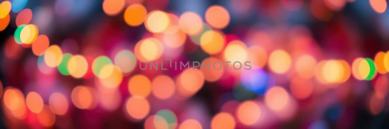 Colorful bokeh lights illuminate the area, creating a joyful atmosphere during a lively evening celebration. The various hues blend together, enhancing the festive mood.