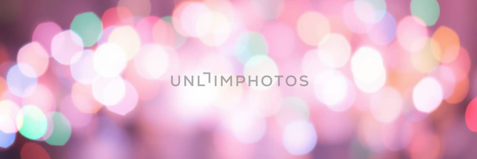 Bright bokeh lights illuminate the evening sky at a local festival, creating a lively, enchanting atmosphere. People enjoy the festivities and celebrate together in joy.