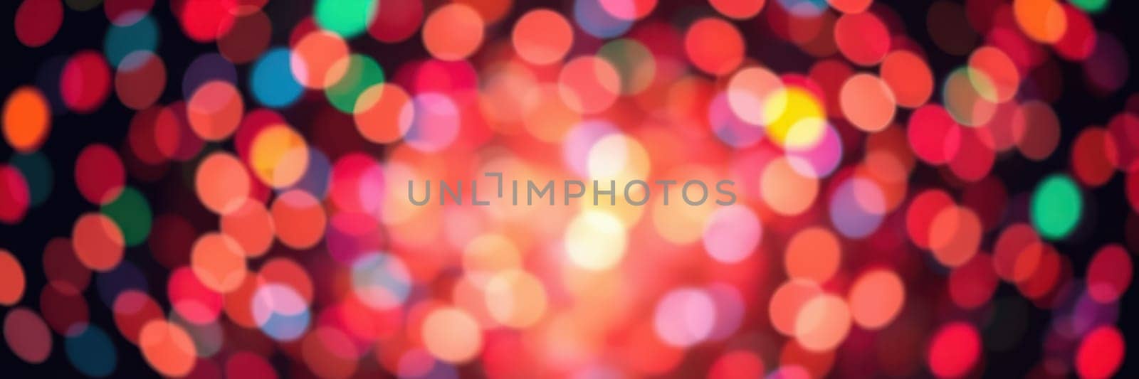 Colorful lights sparkle and shimmer against a dark background, creating a warm and inviting ambiance for a nighttime event with friends and family.