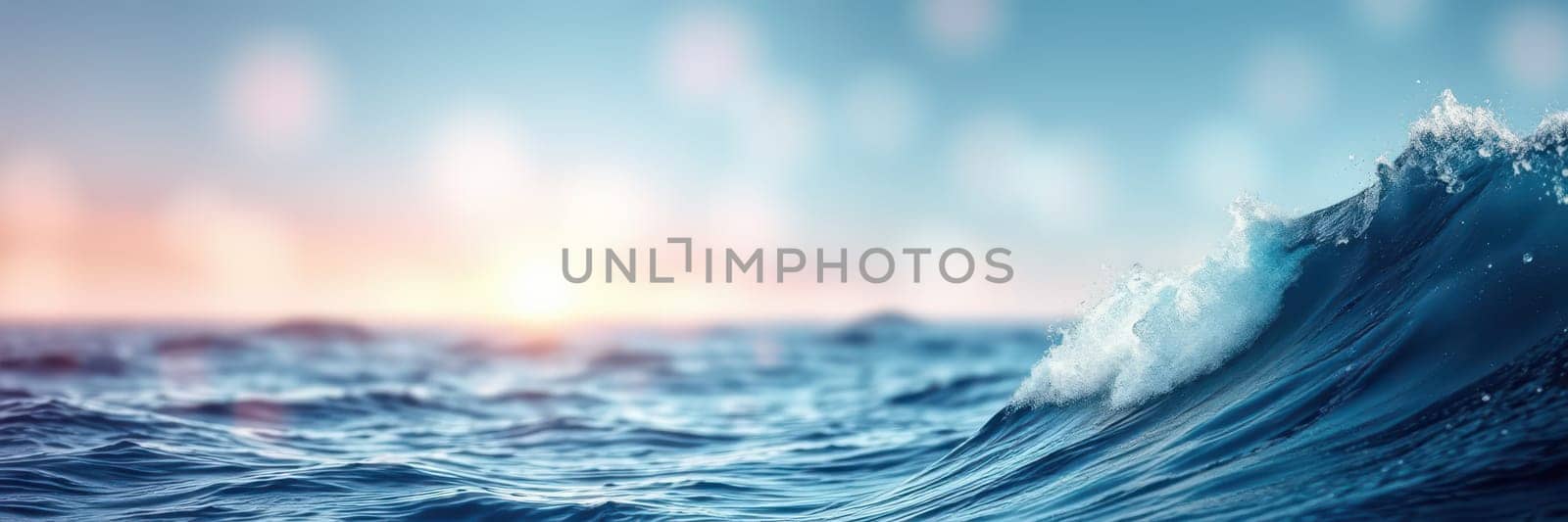 Waves wash ashore at dusk, creating a peaceful atmosphere. The sun sets on the horizon, casting warm hues across the ocean, reflecting on the water's surface.