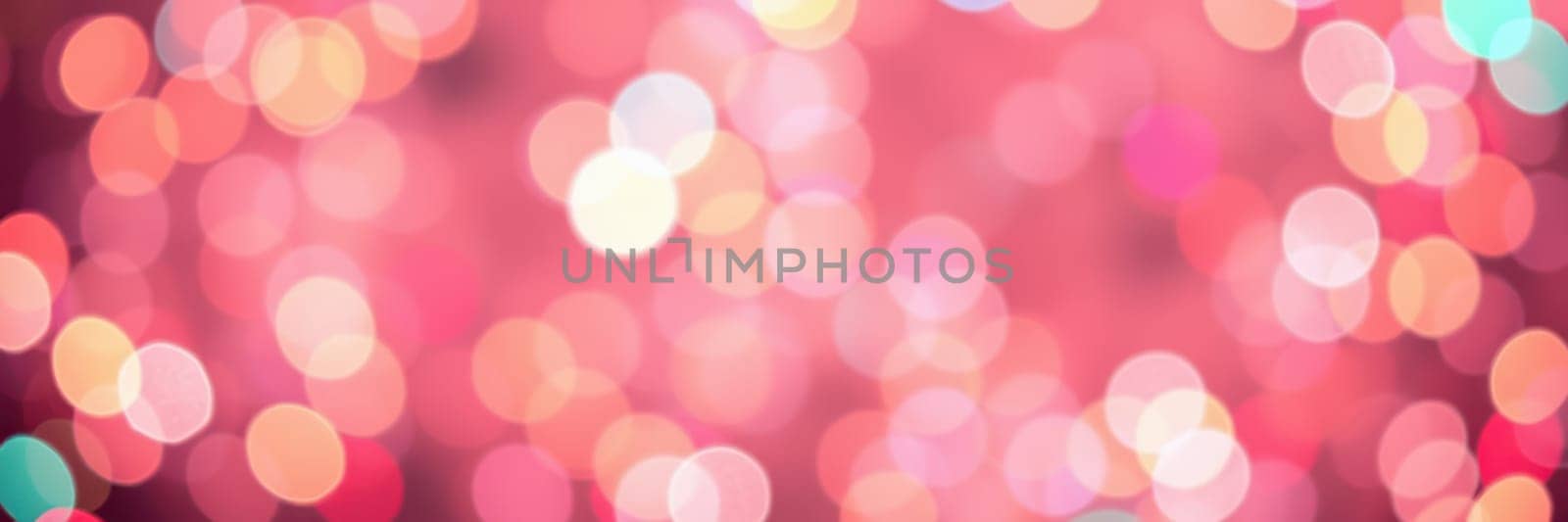 Colorful bokeh lights shimmer softly against a warm pink backdrop, enhancing the mood of a joyful celebration or special event during evening hours.