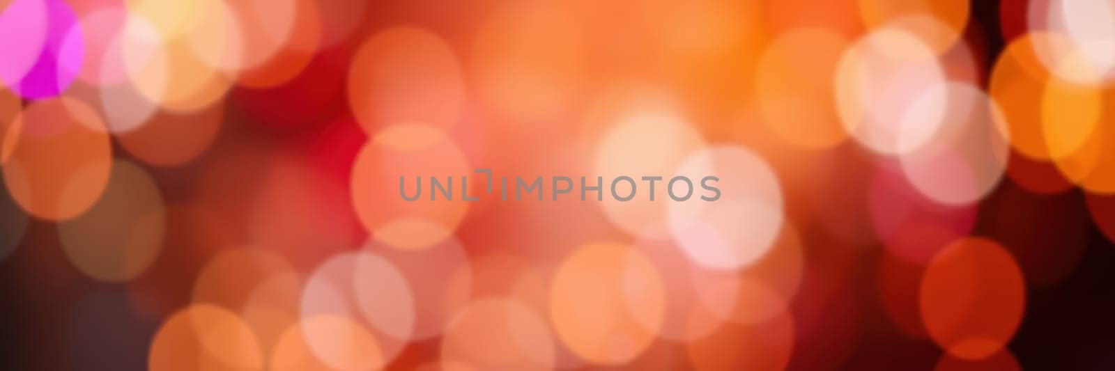 Colorful light patterns shimmer and blend together, creating a lively and energetic atmosphere during a nighttime celebration in an urban environment filled with excitement.