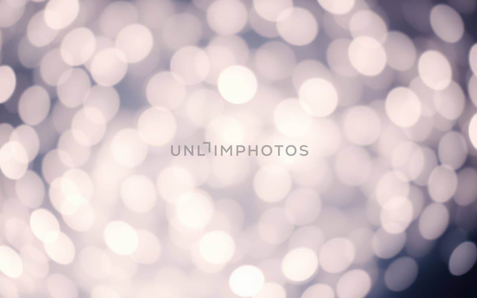 Delicate circles of light fill the background, creating a magical ambiance in a softly blurred setting, perfect for evening gatherings or celebrations.
