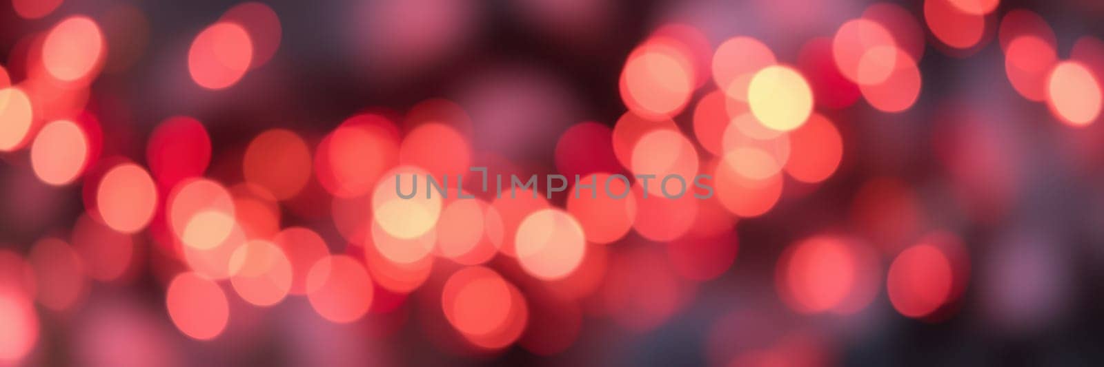 Colorful blurred bokeh lights in shades of red form a vibrant backdrop for an evening event, enhancing the lively ambiance of the outdoor setting filled with joy and celebration.