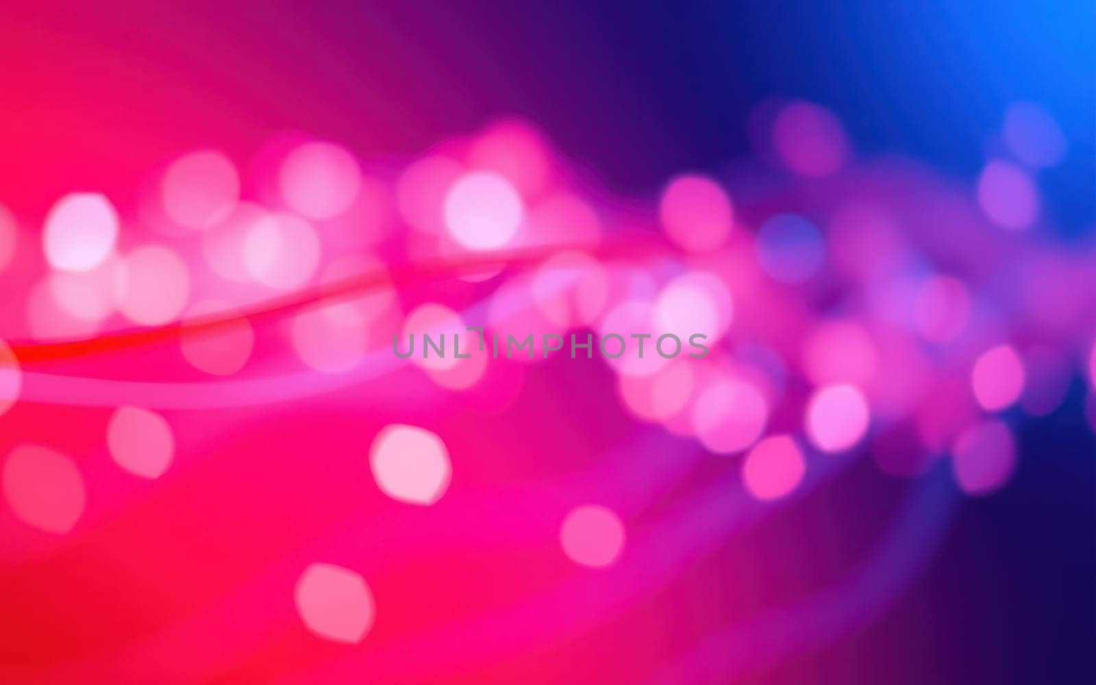 Abstract art design displays an array of vibrant bokeh lights blending in shades of pink and blue, creating a soft, dreamy atmosphere. The composition invites creativity and inspiration.