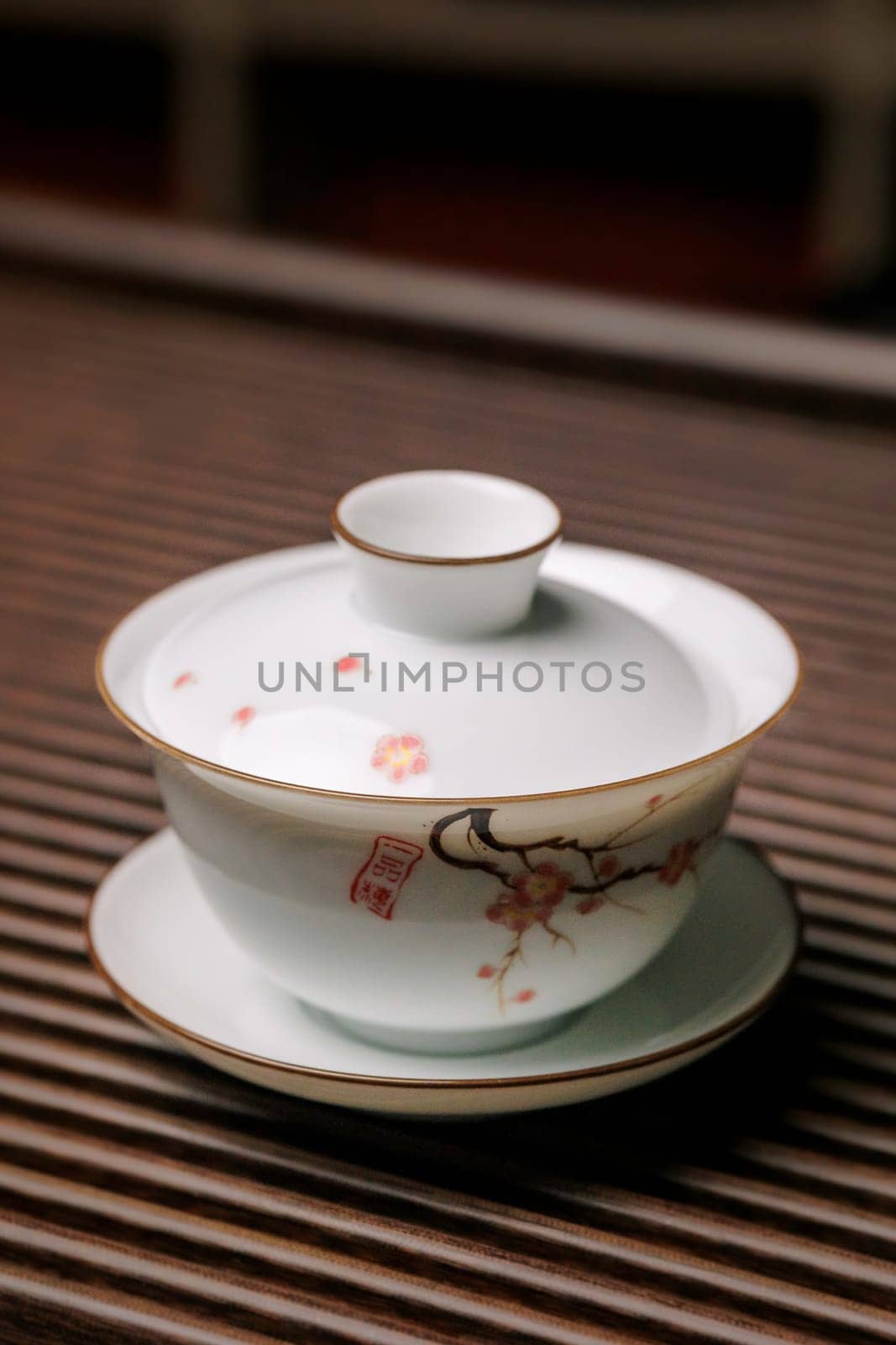 A stunning Chinese tea set with intricate floral patterns, perfect for passionate tea lovers everywhere
