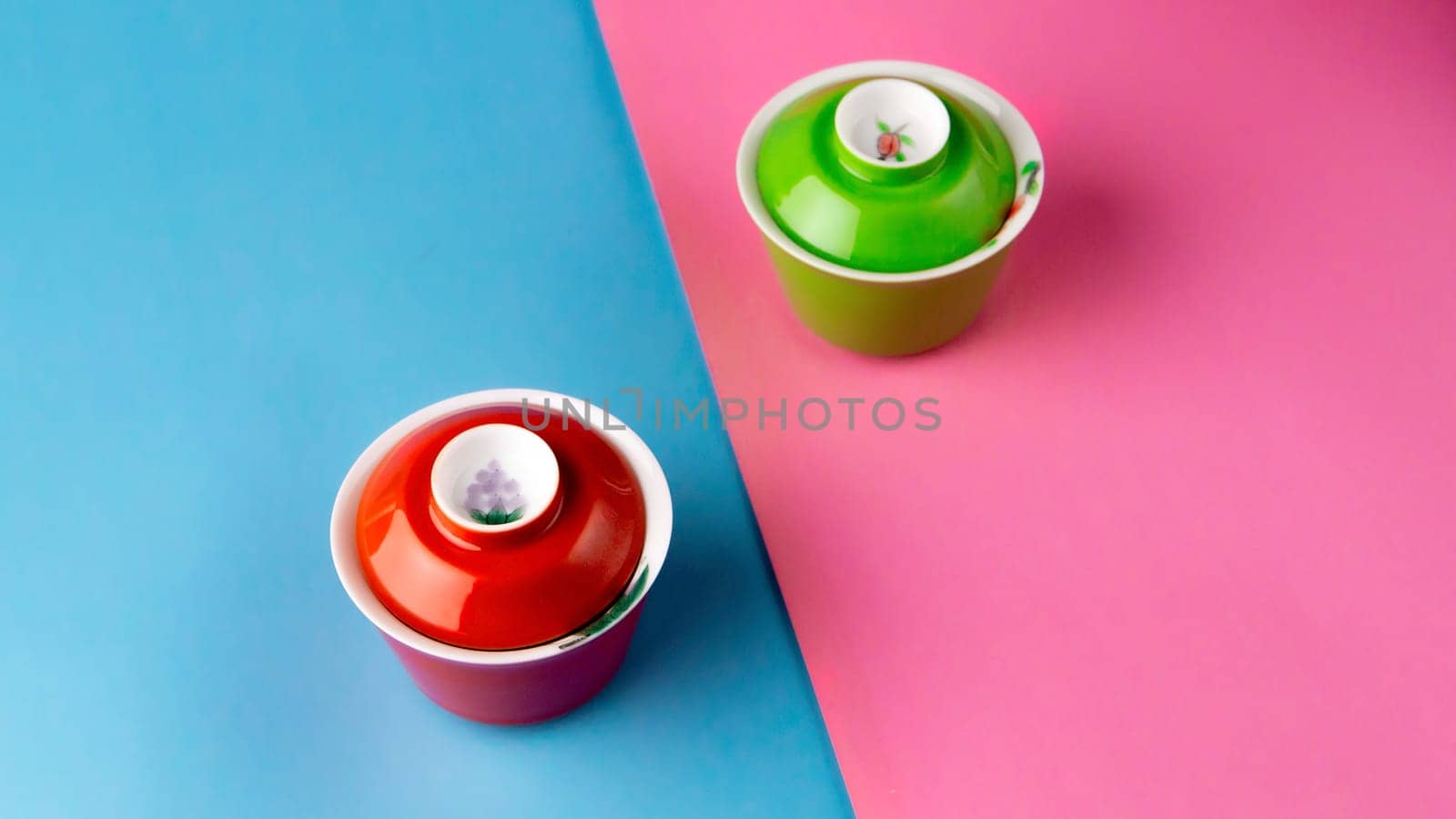 Two vibrant dessert bowls, beautifully displayed on contrasting pastel backgrounds, showcase a stunning modern design