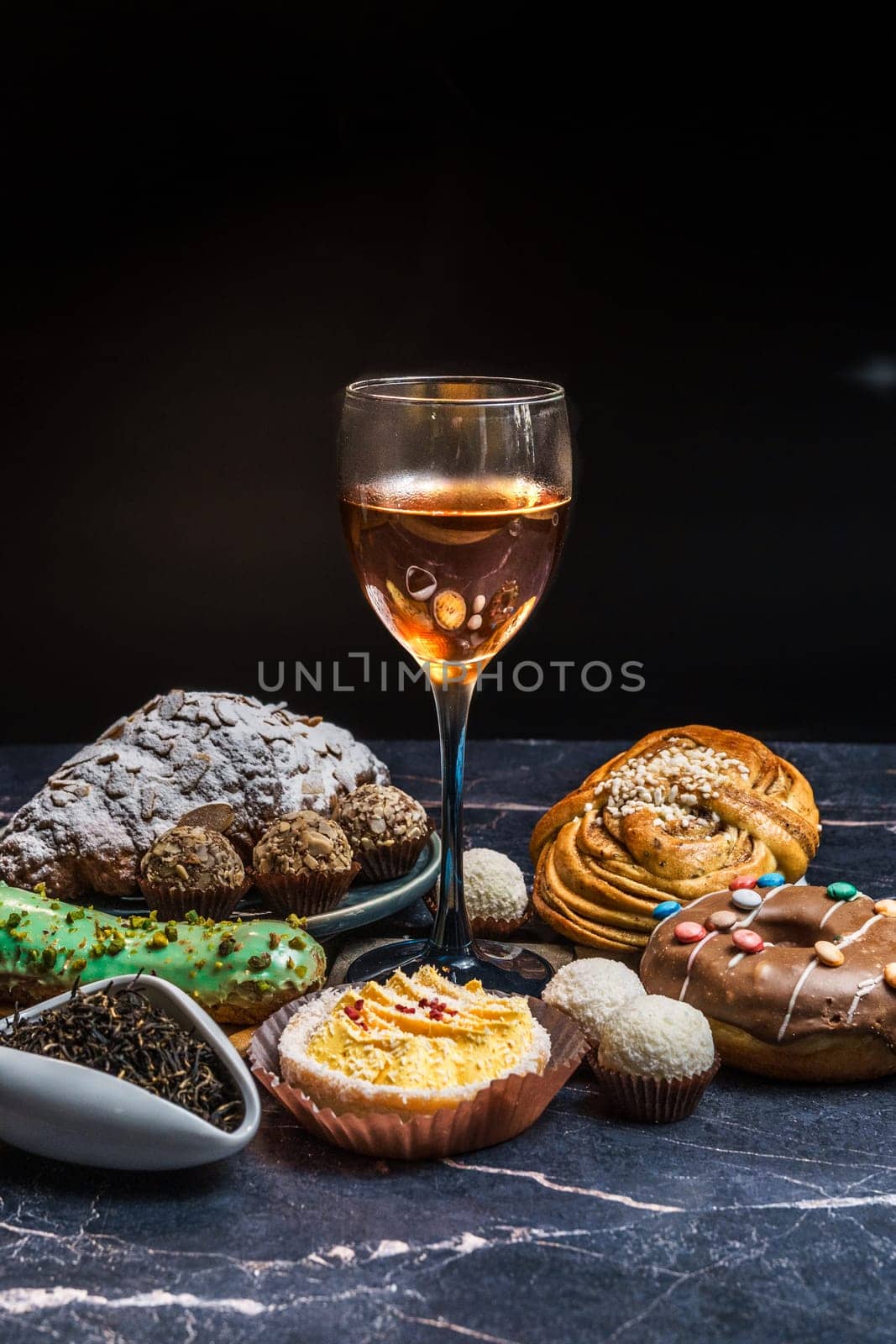 Indulge in a rich and delightful assortment of exquisite desserts, artfully paired with elegant wine selections