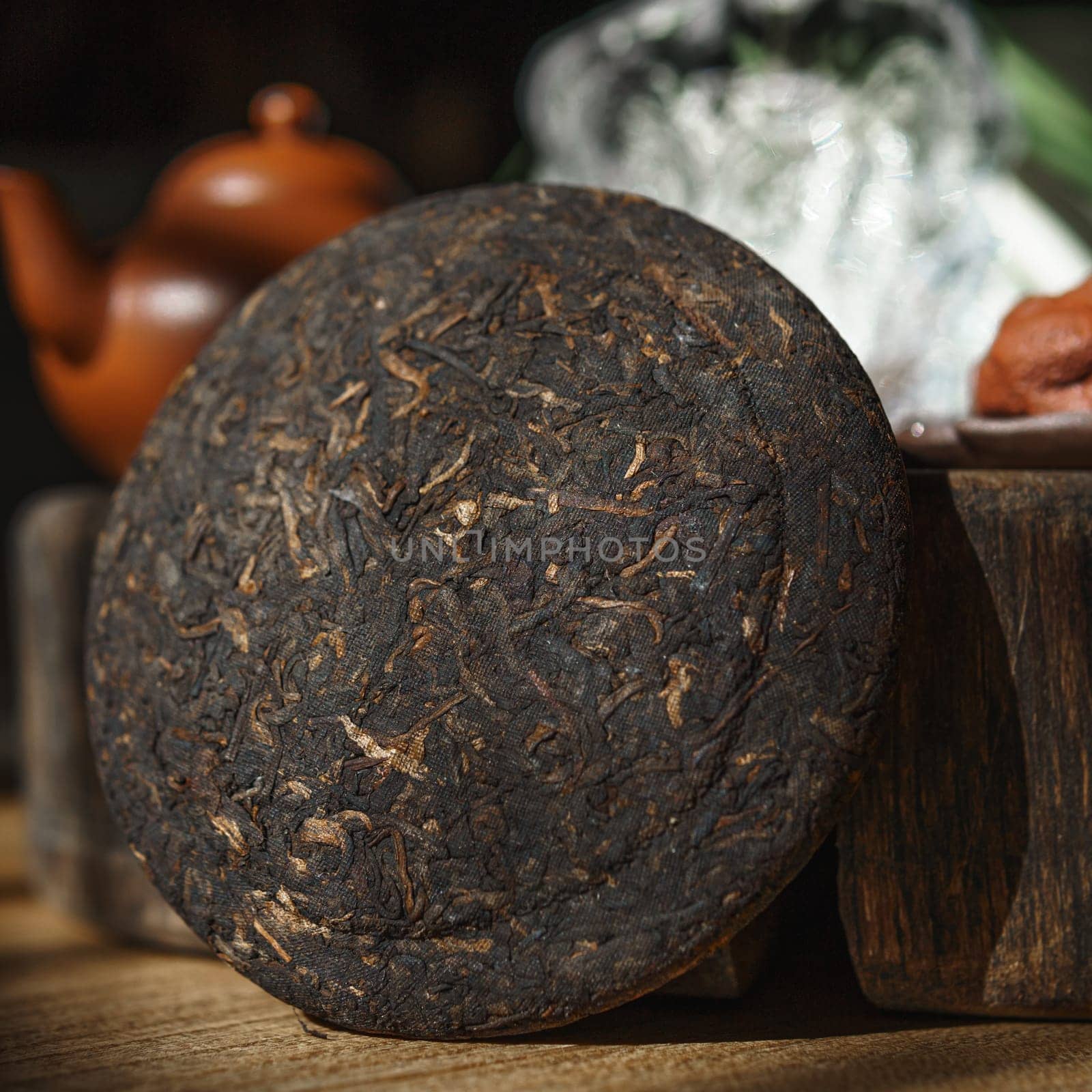 An exquisite, aged puerh tea cake that beautifully highlights and celebrates traditional tea culture and history