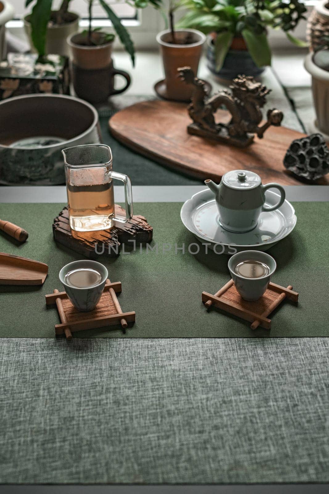A serene tea placement showcasing exquisite teaware amid lush greenery, ideal for ultimate relaxation benefits