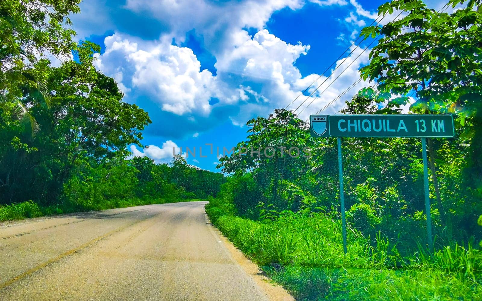 Chiquila Quintana Roo Mexico 11. July 2024 Road signs Signposts and information boards to ferry pier of Chiquila on jungle road highway in Lazaro Cardenas in Quintana Roo Mexico.