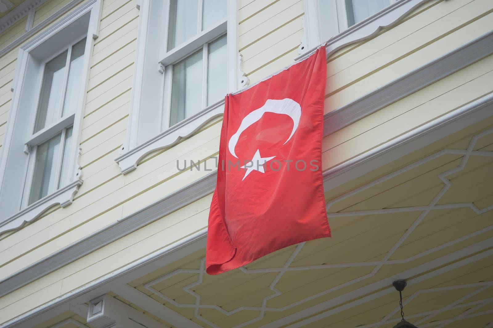 Turkish flag hanging on the window.