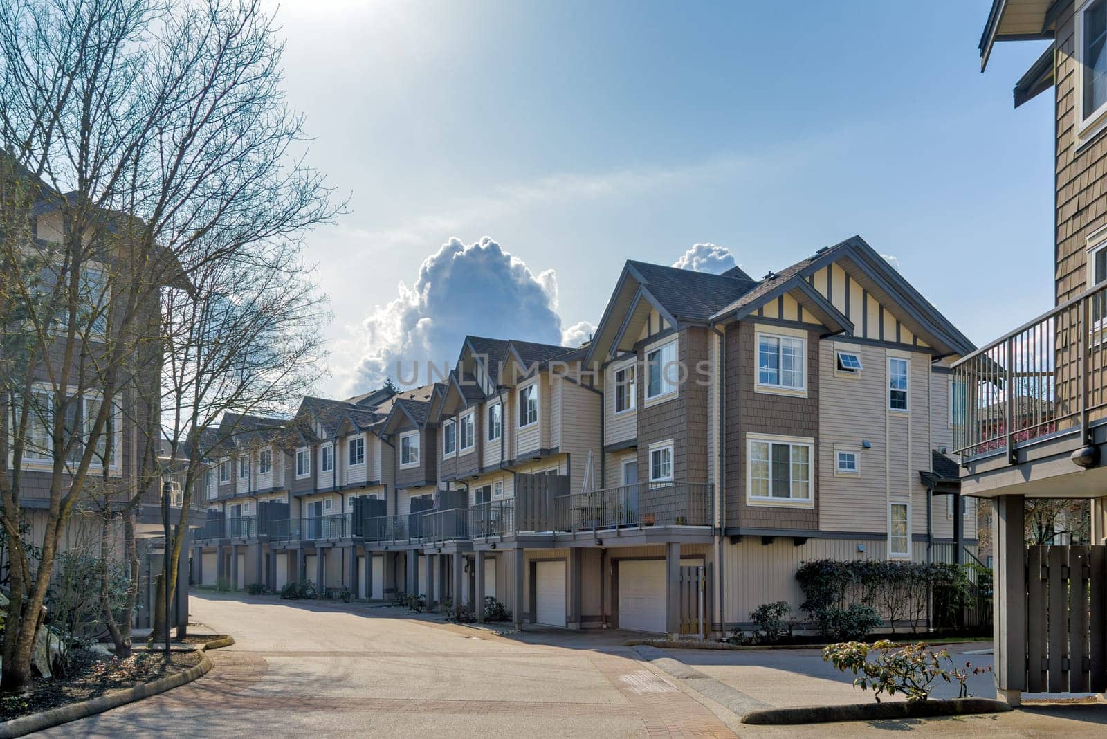 A perfect neighbourhood. New townhouses on early spring season in Vancouver, Canada.