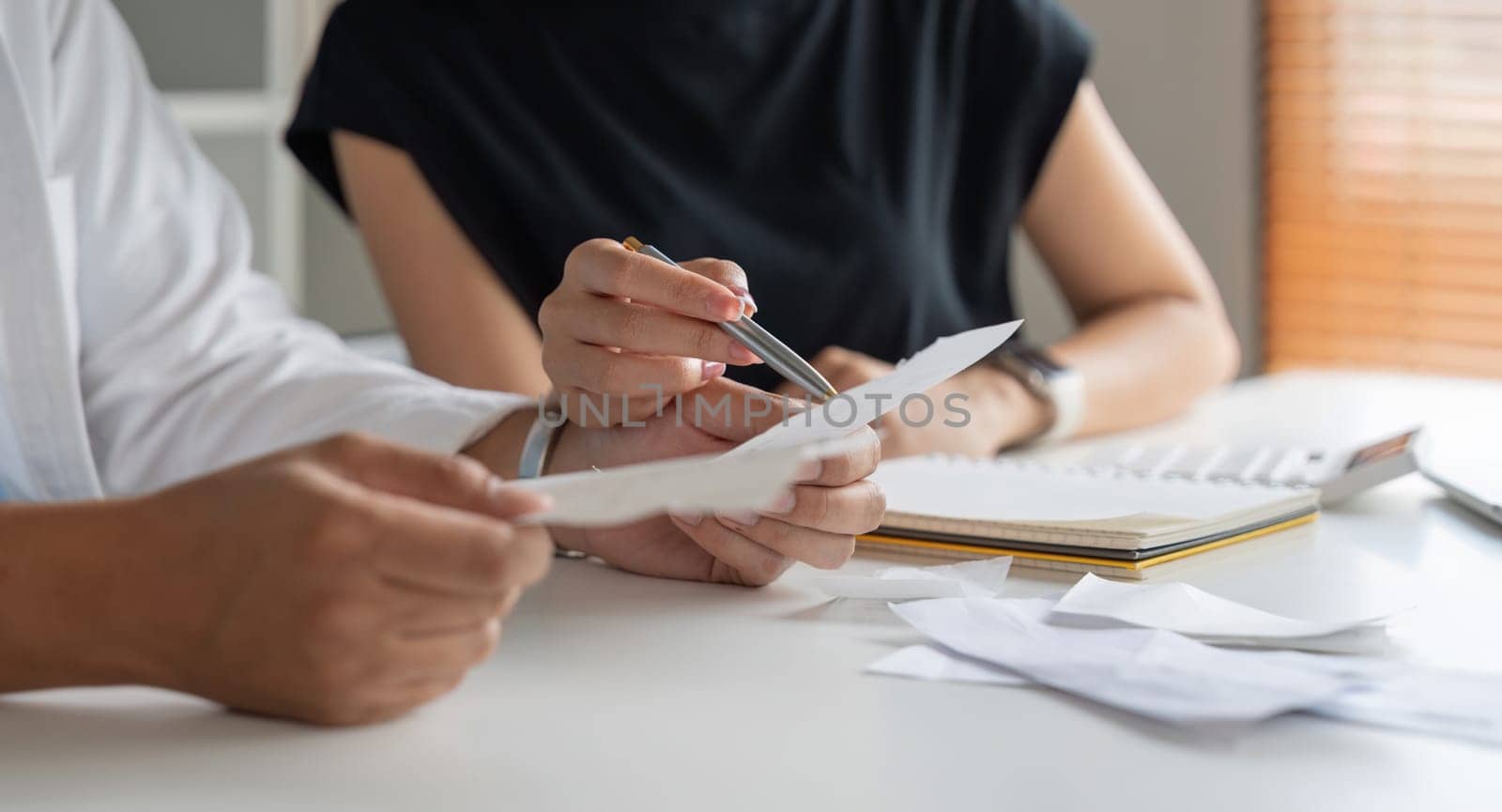 Asian couple analyze expense or finance in deposit account and daily income bill together. savings economy concept.