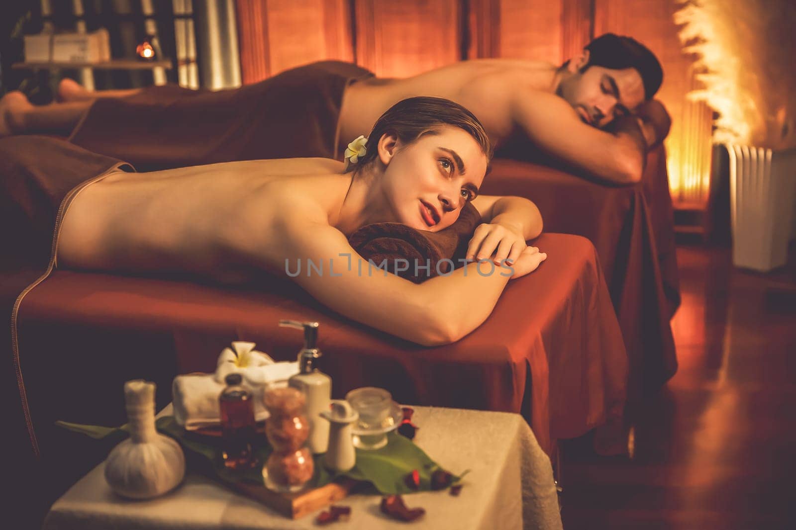 Caucasian couple customer enjoying relaxing anti-stress massage. Quiescent by biancoblue