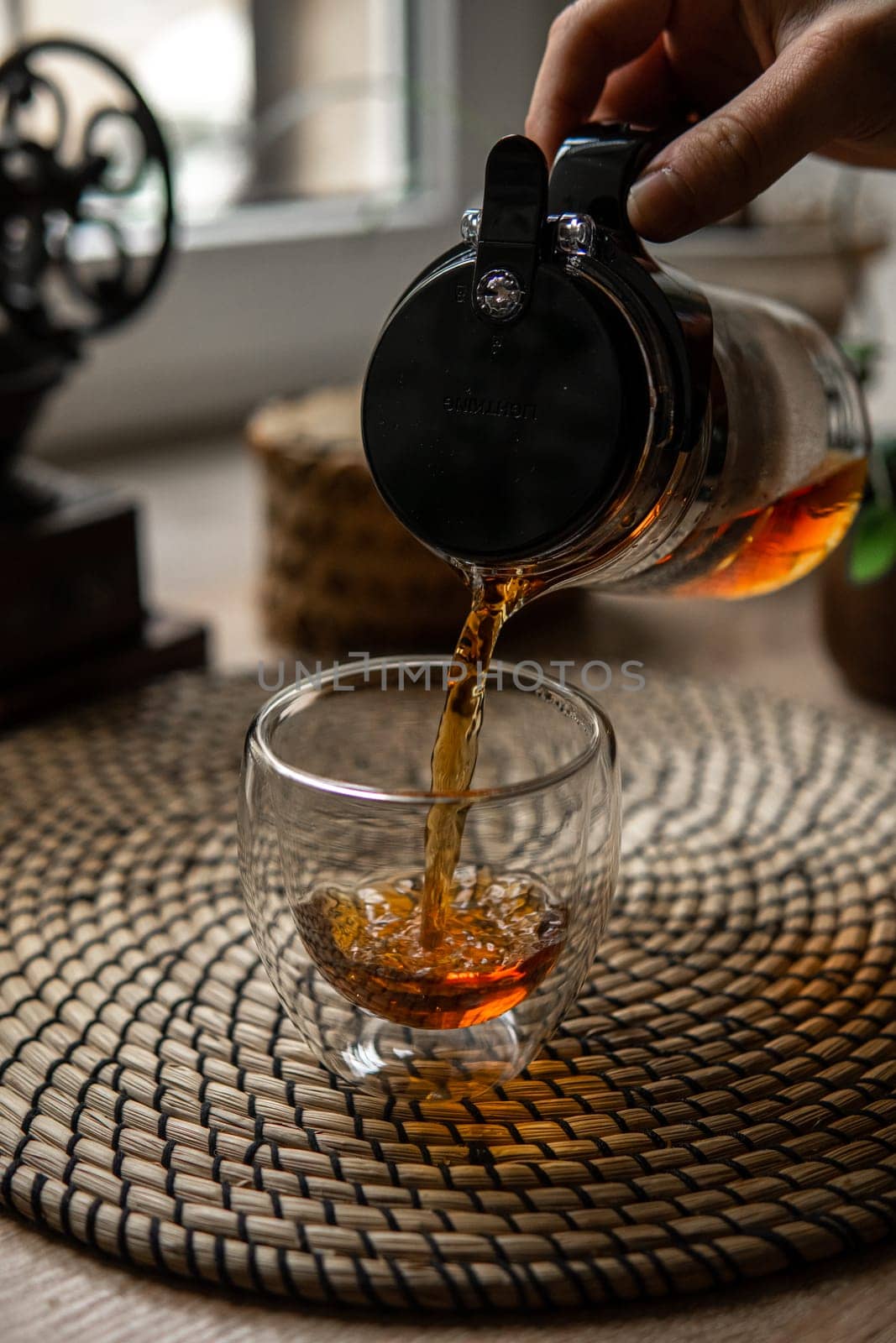 A cozy scene with tea in a delicate cup brings comfort and deep relaxation, enhancing the experience