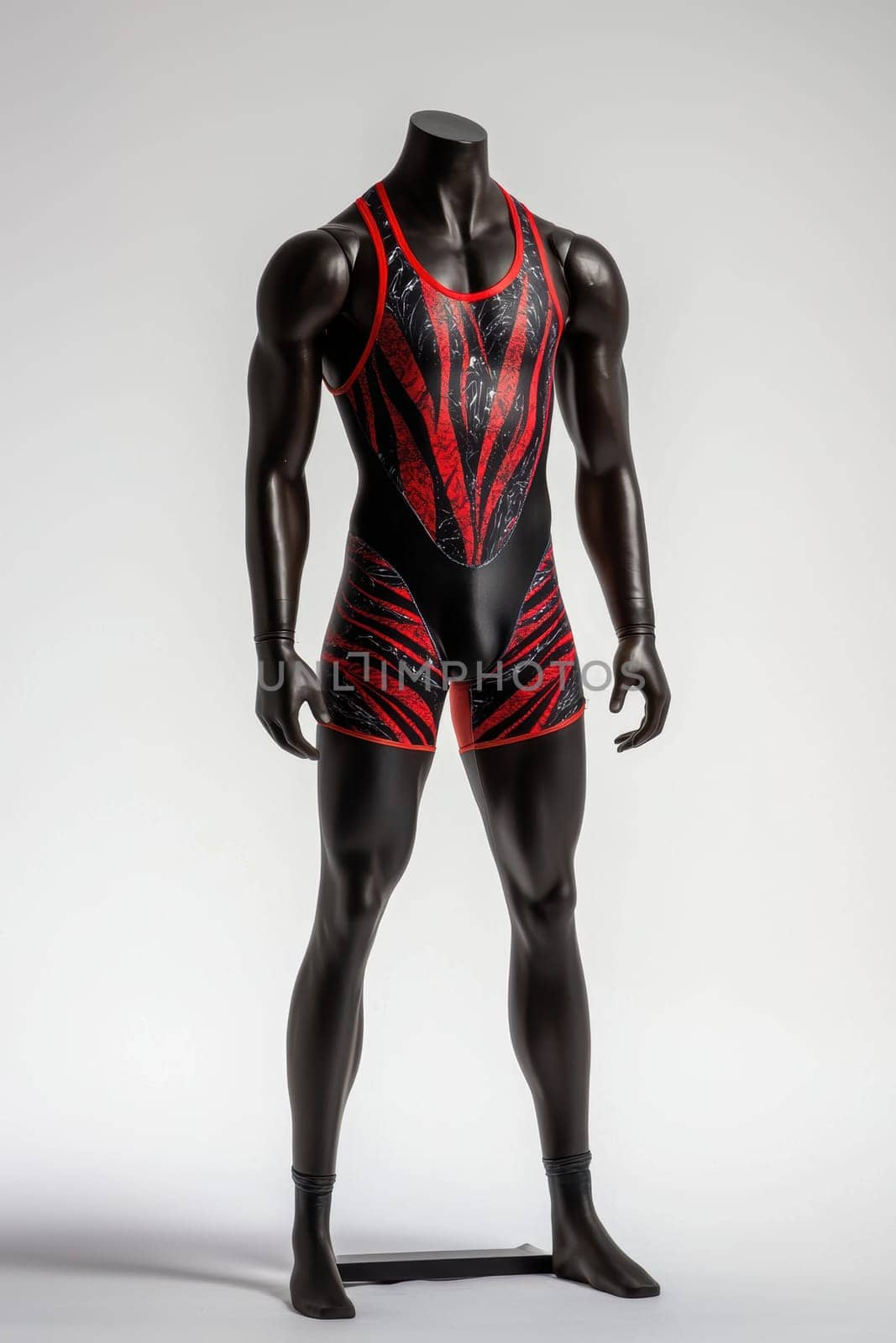 Professional studio shot featuring a vibrant wrestling jersey on a mannequin set against a clean white background. highlights bold colors and design elements ideal for brand customization or logo placement, focusing on sports apparel marketing.