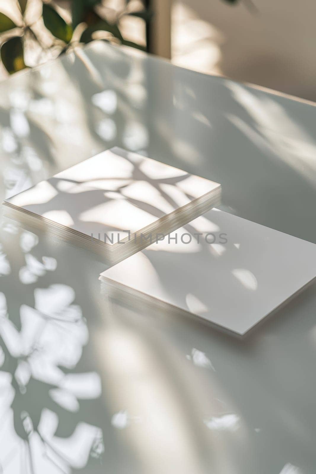 Rectangular sticker mockup featuring elegant branding set on a glass surface, showcasing soft reflections and bright natural lighting, ideal for showcasing designs in a professional and sophisticated manner.