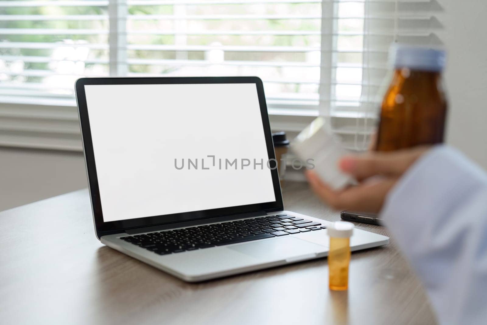 A doctor recommends medication for treatment through an online consultation, showcasing modern healthcare technology.