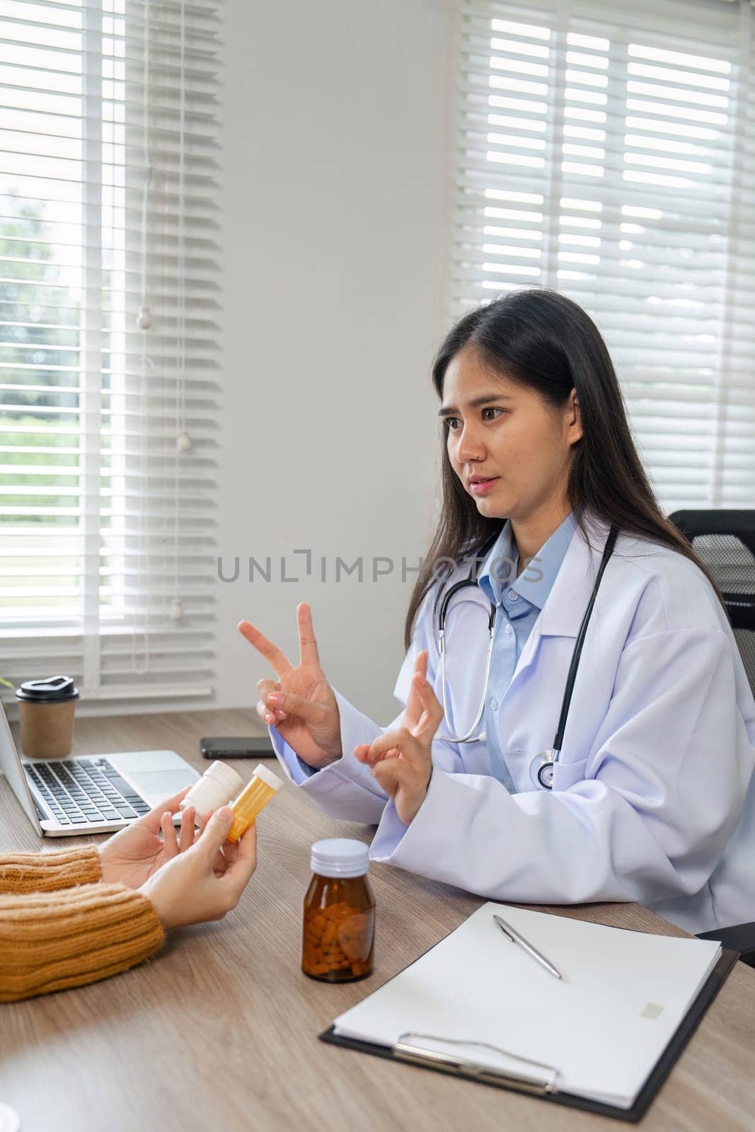 A doctor consults online, recommending medication for effective treatment, showcasing modern healthcare practices.