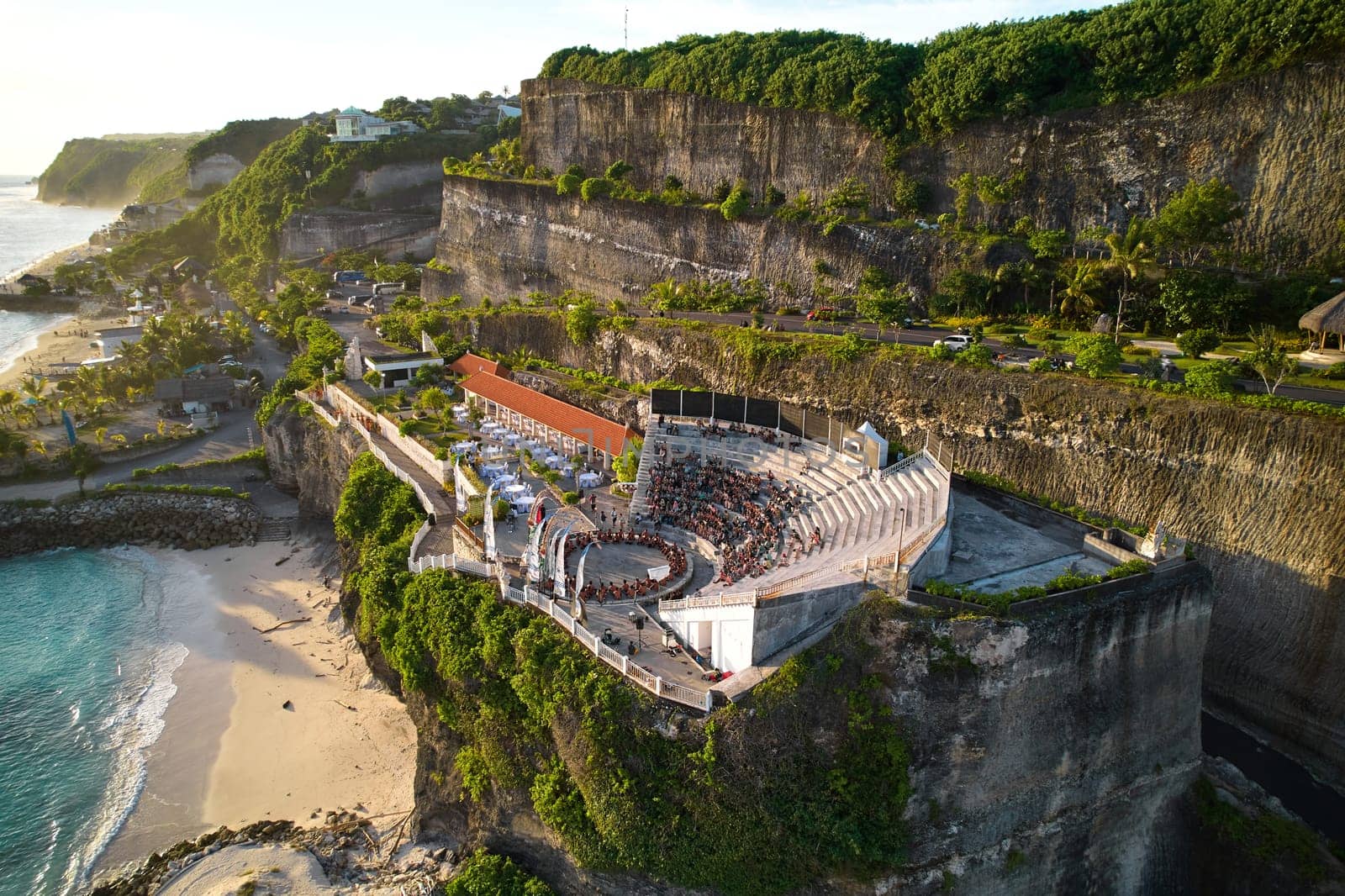 The amphitheater of the local show Kecak Dance at Melasti Beach over a cliff near the ocean on the island of Bali