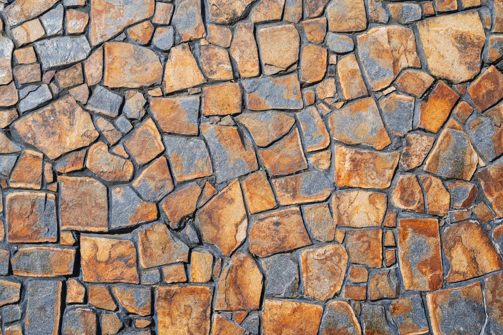 Pattern of stone wall surface. The surface of natural masonry. The structure is in the grunge style.