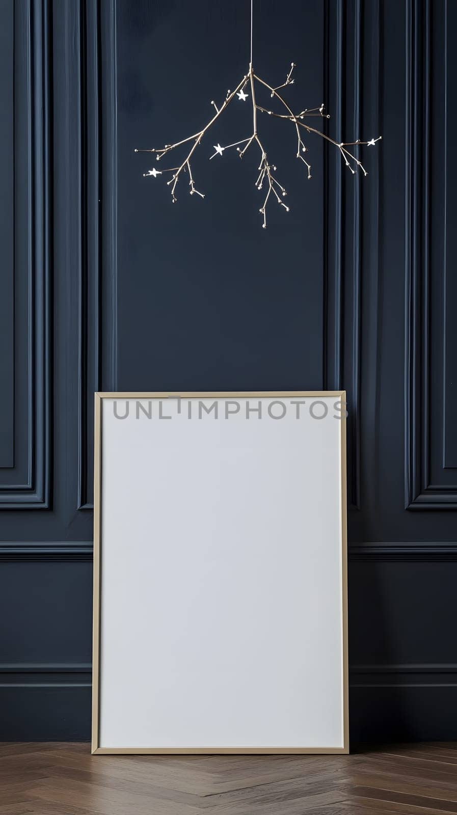 A blank canvas in a stylish interior with a modern light fixture.