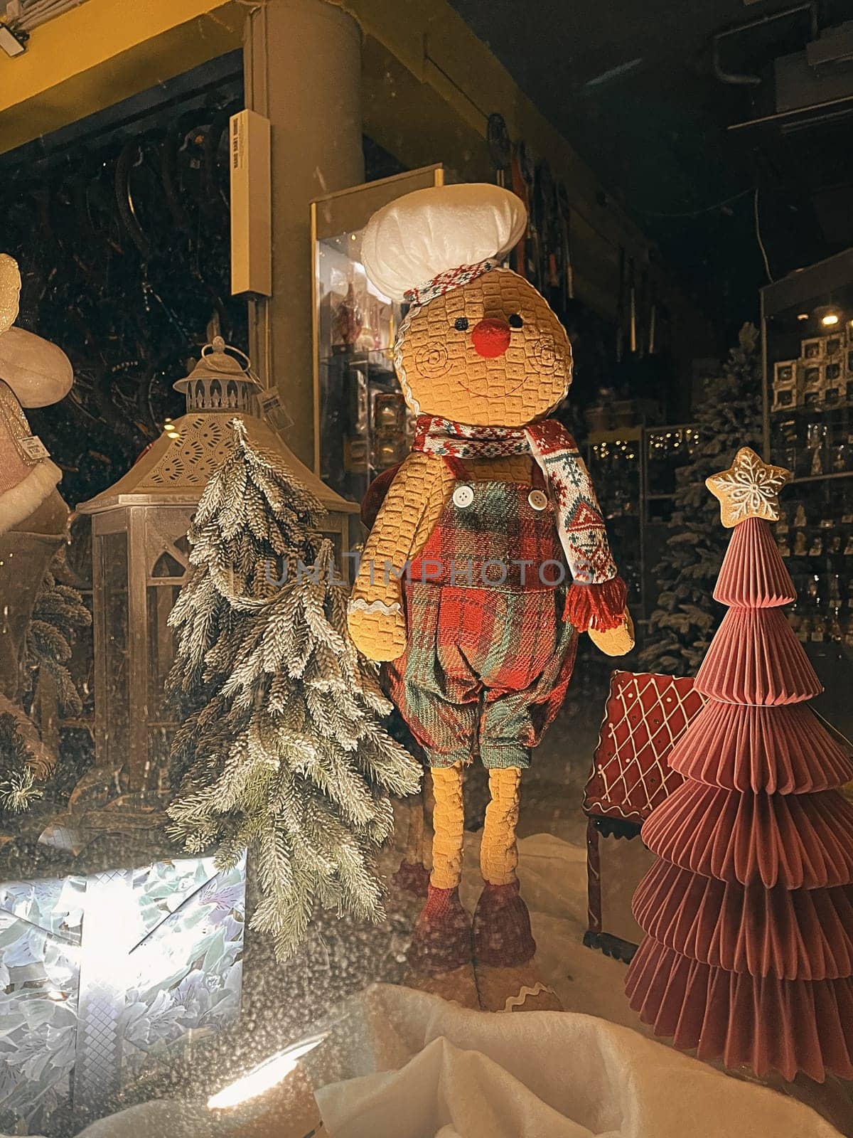 Aesthetic Warm Vintage Shop Window Photo with Snowman for Christmas. High quality photo
