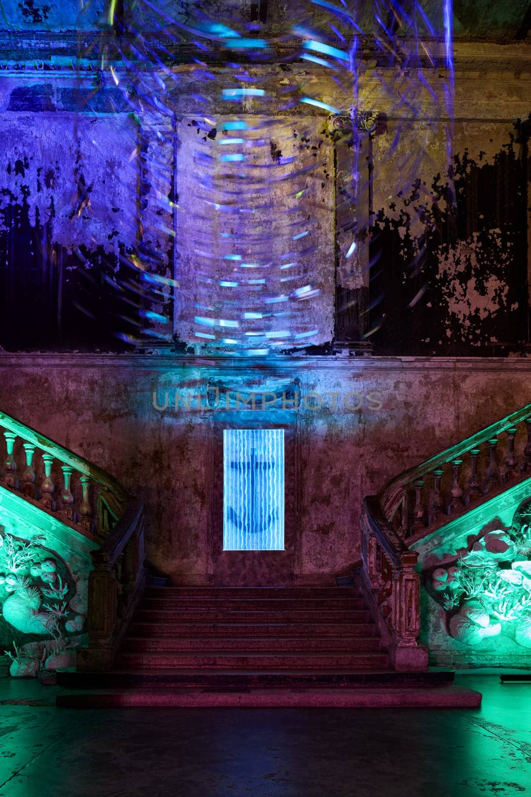 A stunning view of beautifully illuminated stairs showcasing vibrant colors along with a captivating anchor design