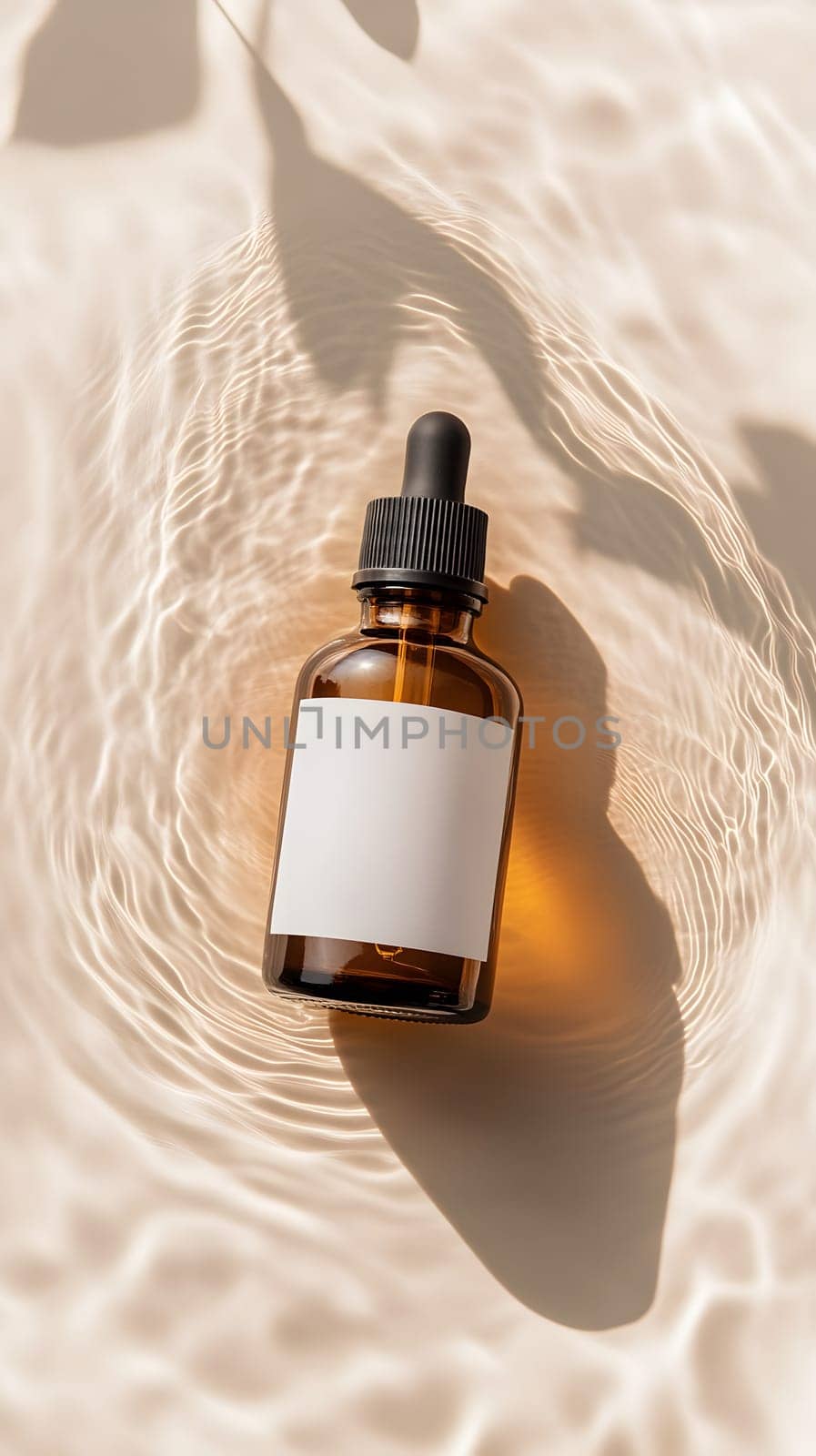 A glass dropper bottle with a blank label on a textured surface.