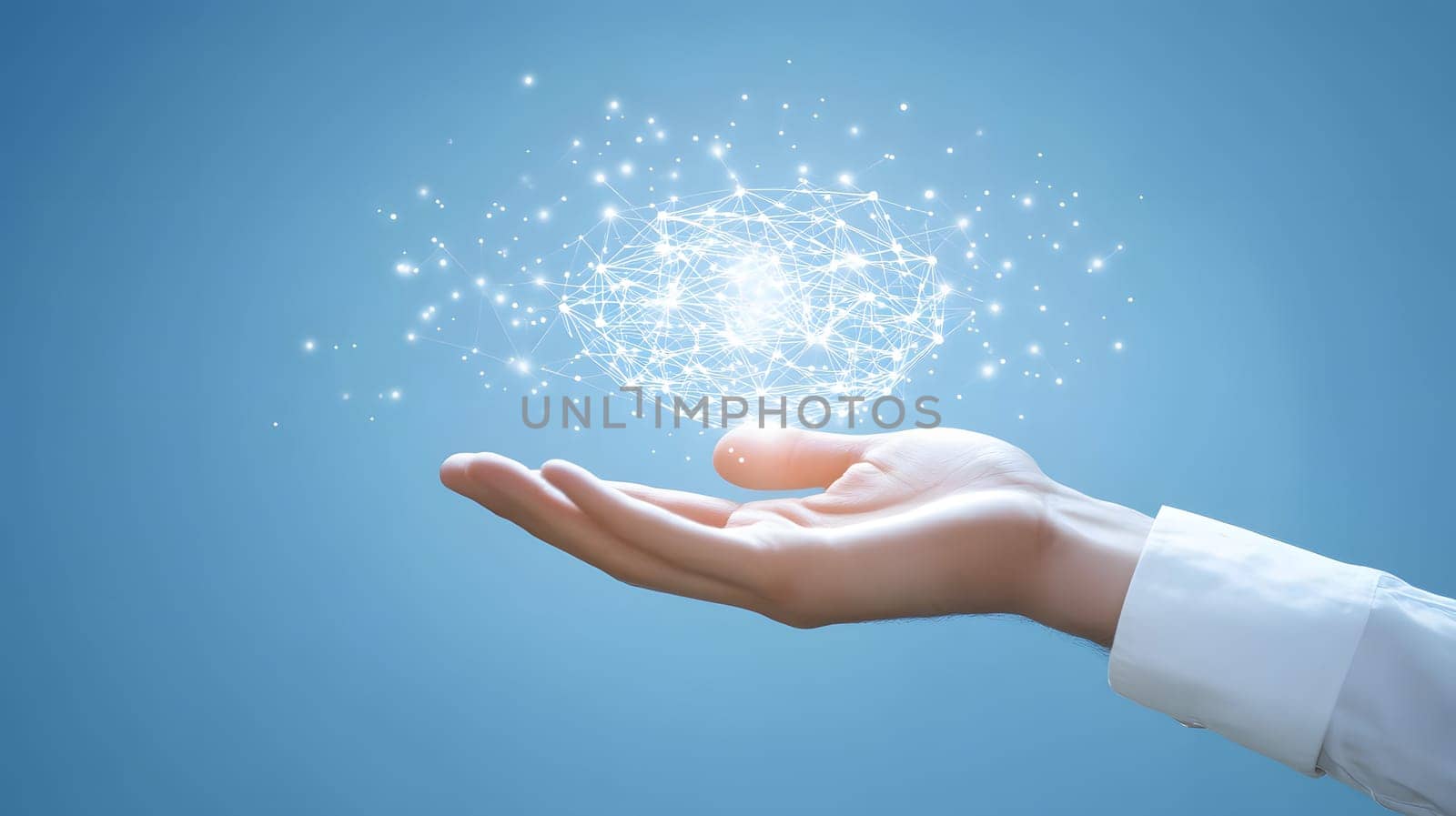 A hand holding glowing particles, symbolizing innovation and ideas.
