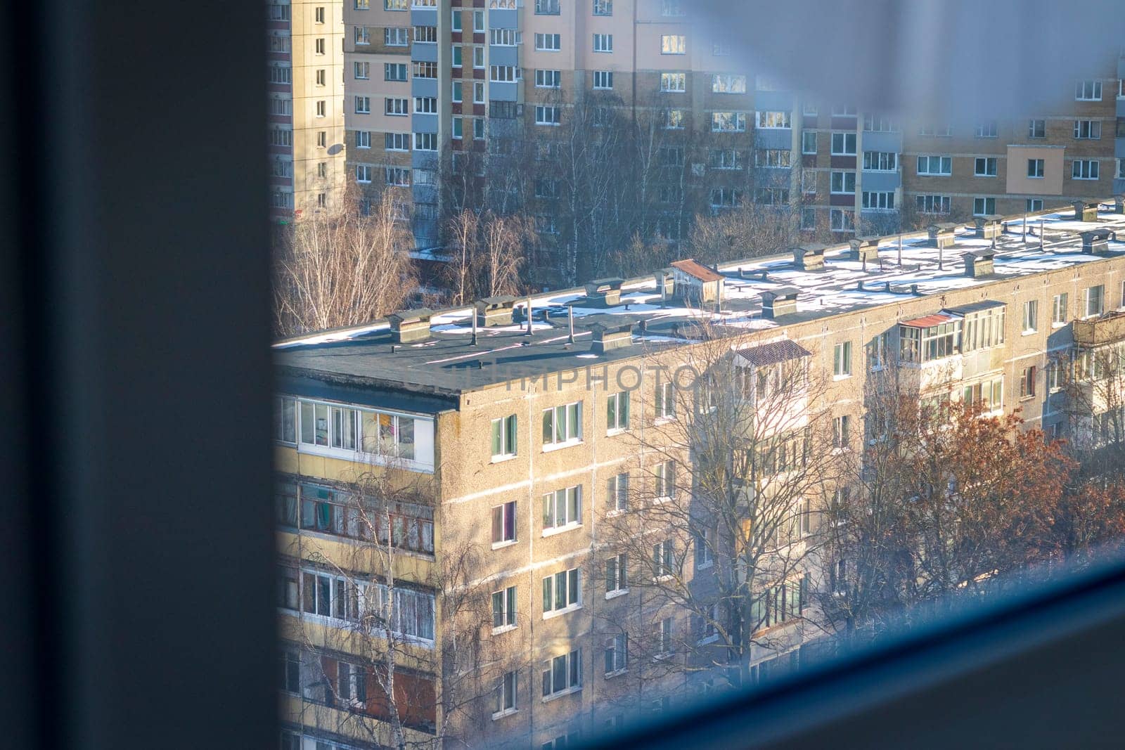 Typical eastern european city seen trough window at winter