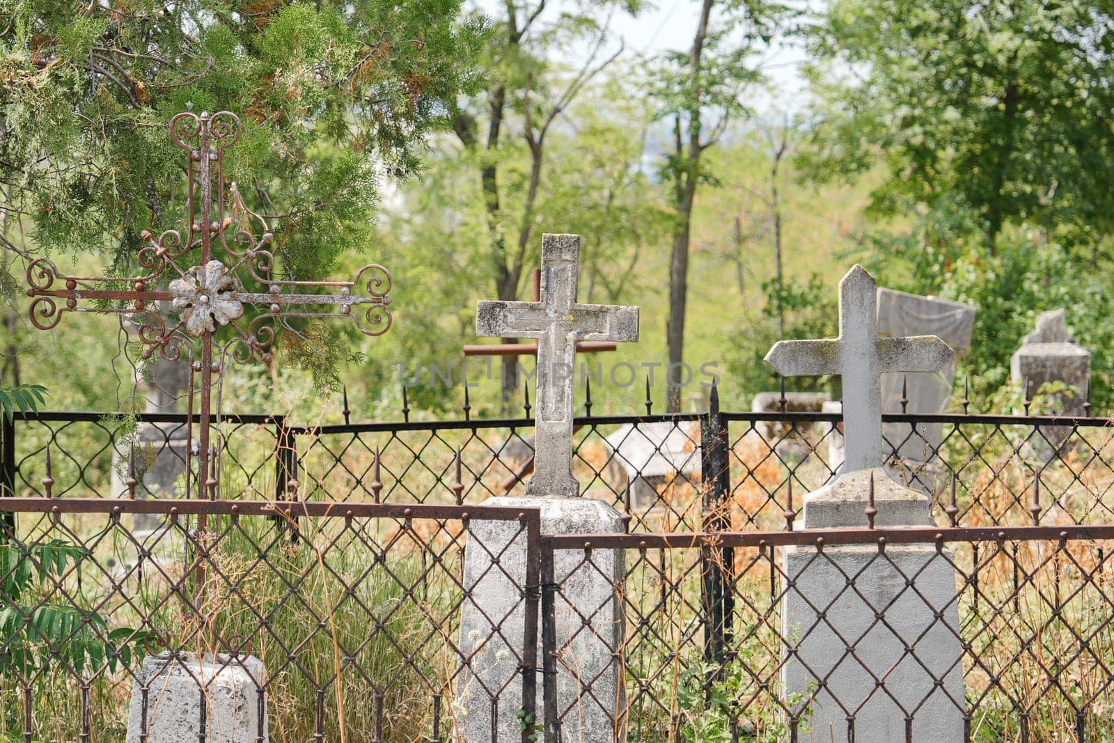 Abandoned graves in a cemetery Russia