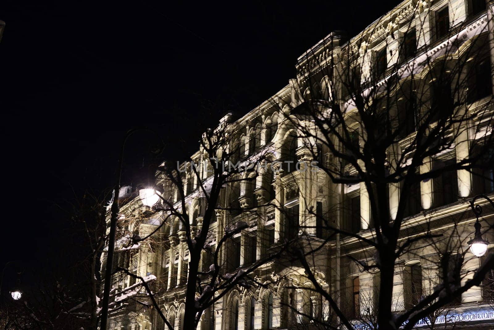 A historic building stands proud against the night sky, showcasing stunning architecture and timeless elegance