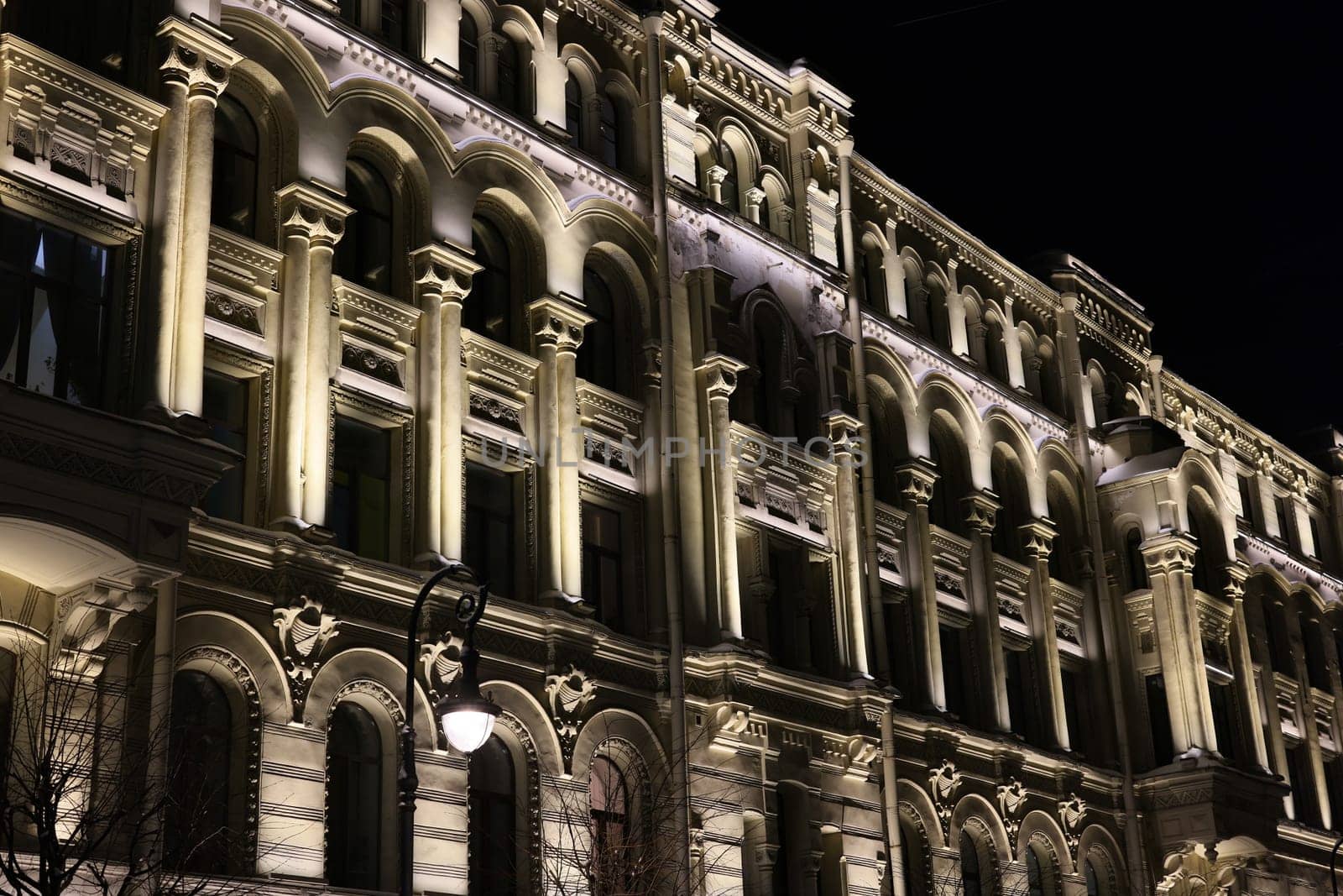 There is a stunning and captivating view of a beautifully lit historical building at night that mesmerizes all