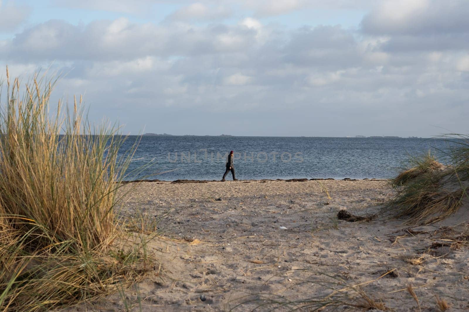 Coastline with houses at the Danish coast. View to beautiful landscape. North sea coast. House by the sea. Denmerk - December 20, 2023