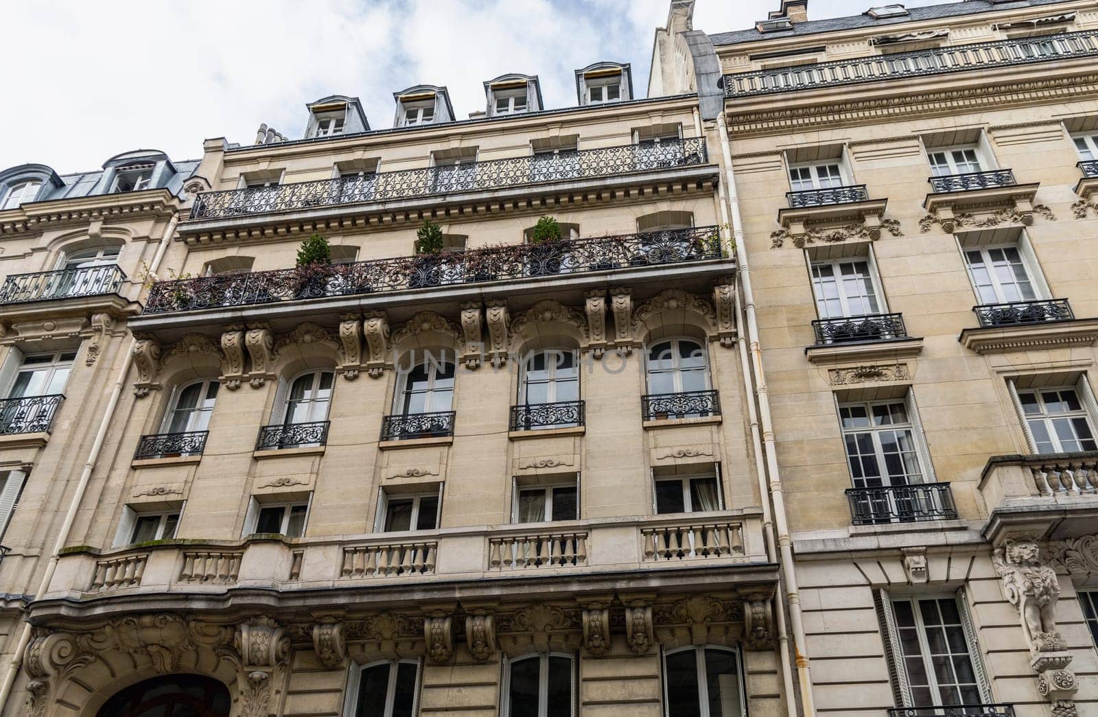 Old and expensive residential building in the city center of Paris, France. High quality photo