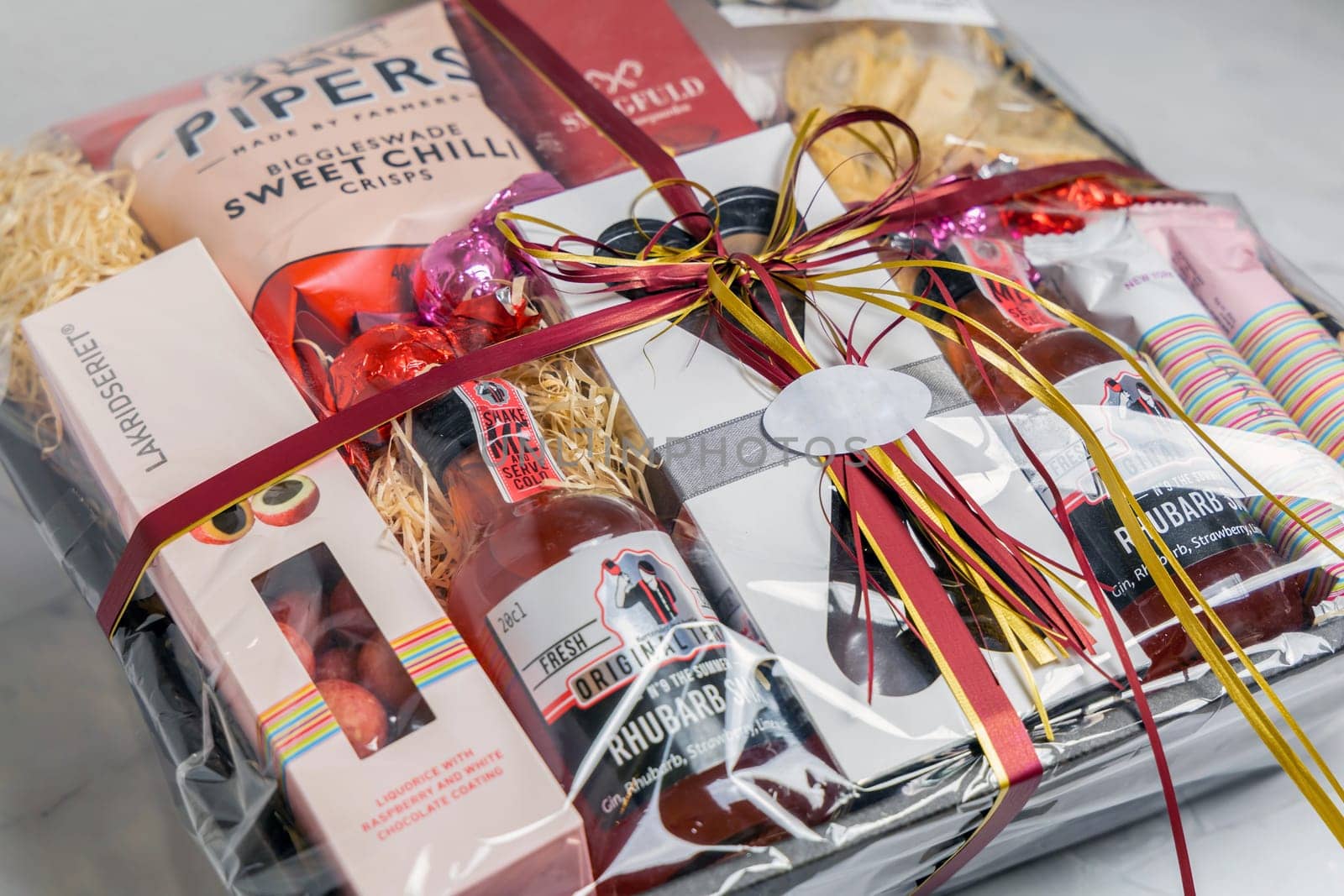 Gift box with various chocolates and snacks. Denmark - November 4, 2023.