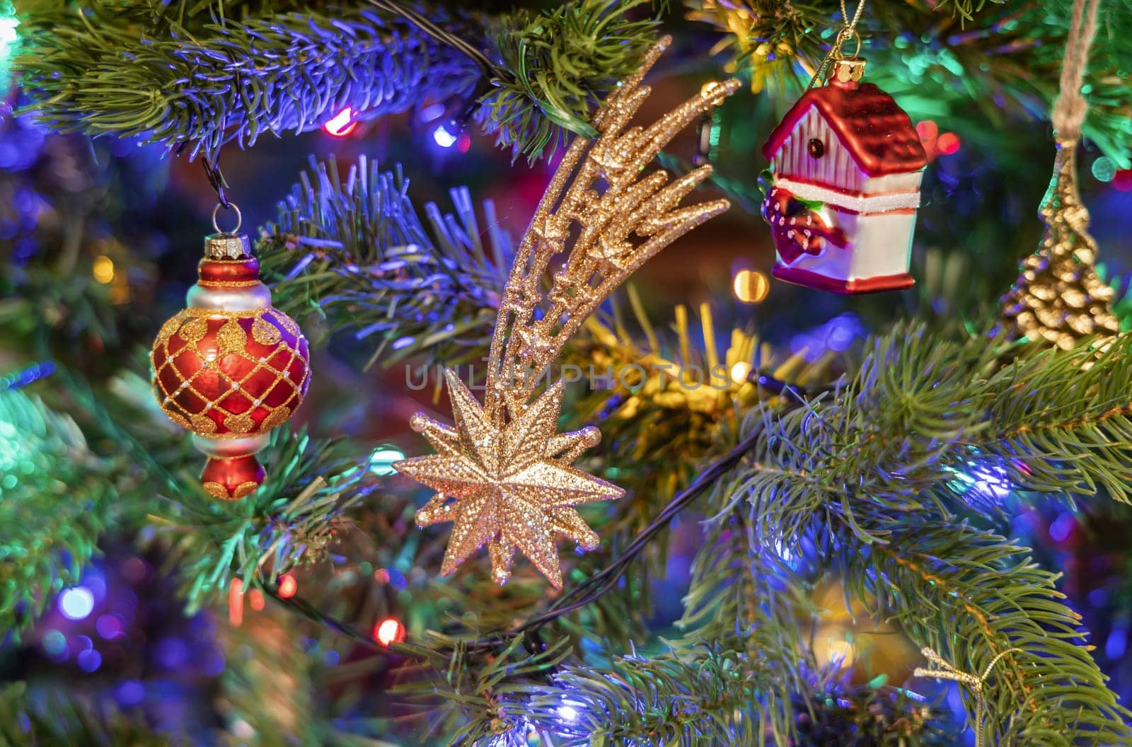Christmas tree decorated with balls and gerland. High quality photo