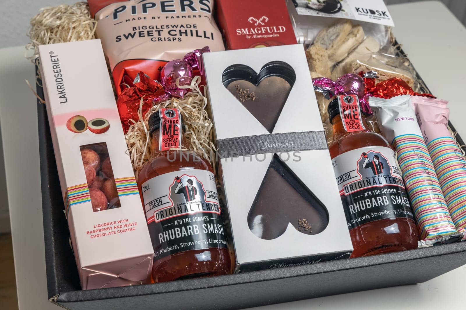 Gift box with various chocolates and snacks. Denmark - November 4, 2023.