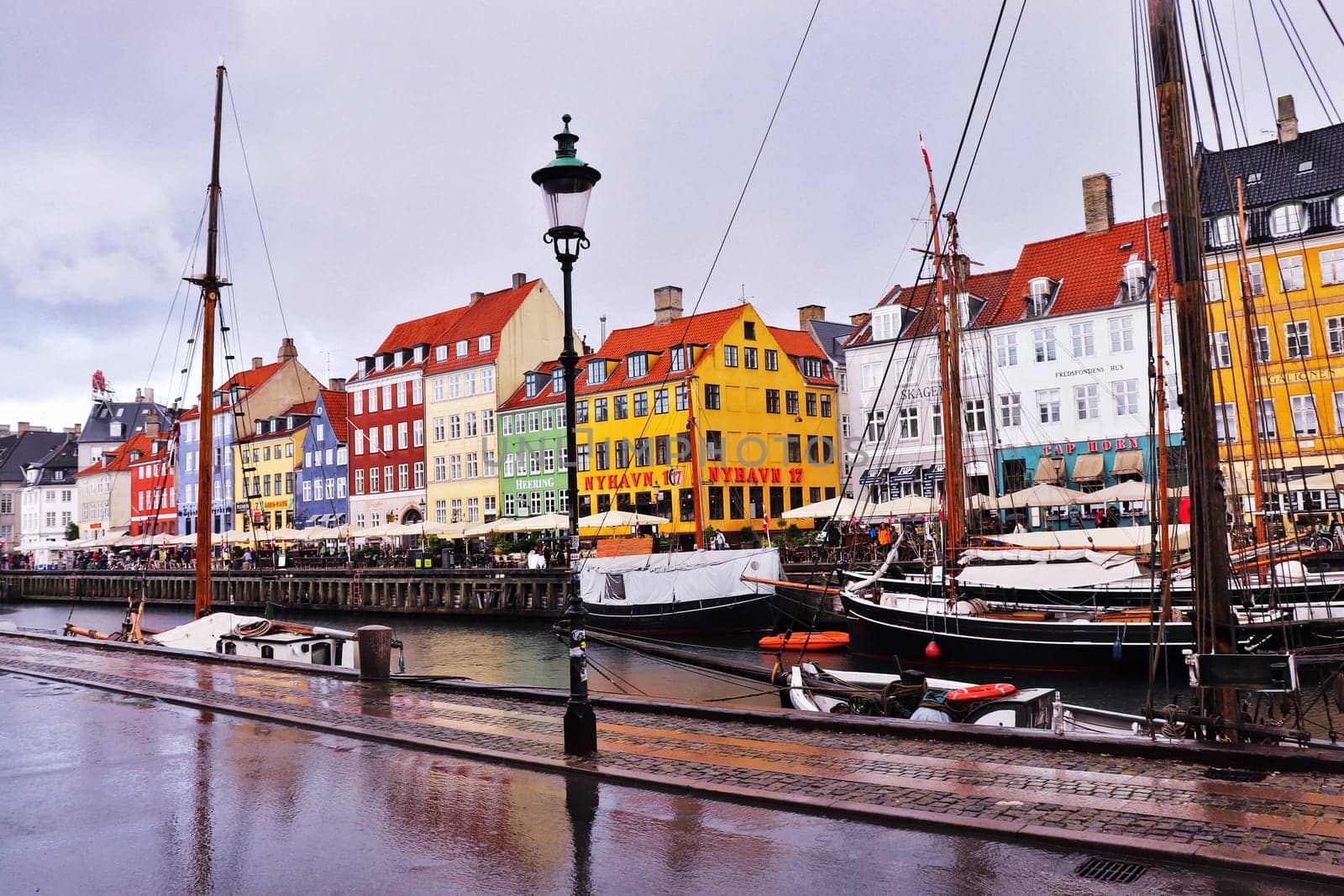 Nyhavn district in Copenhagen. City center panoramic view of colorful houses. Copenhagen, Denmark - September 10, 2023