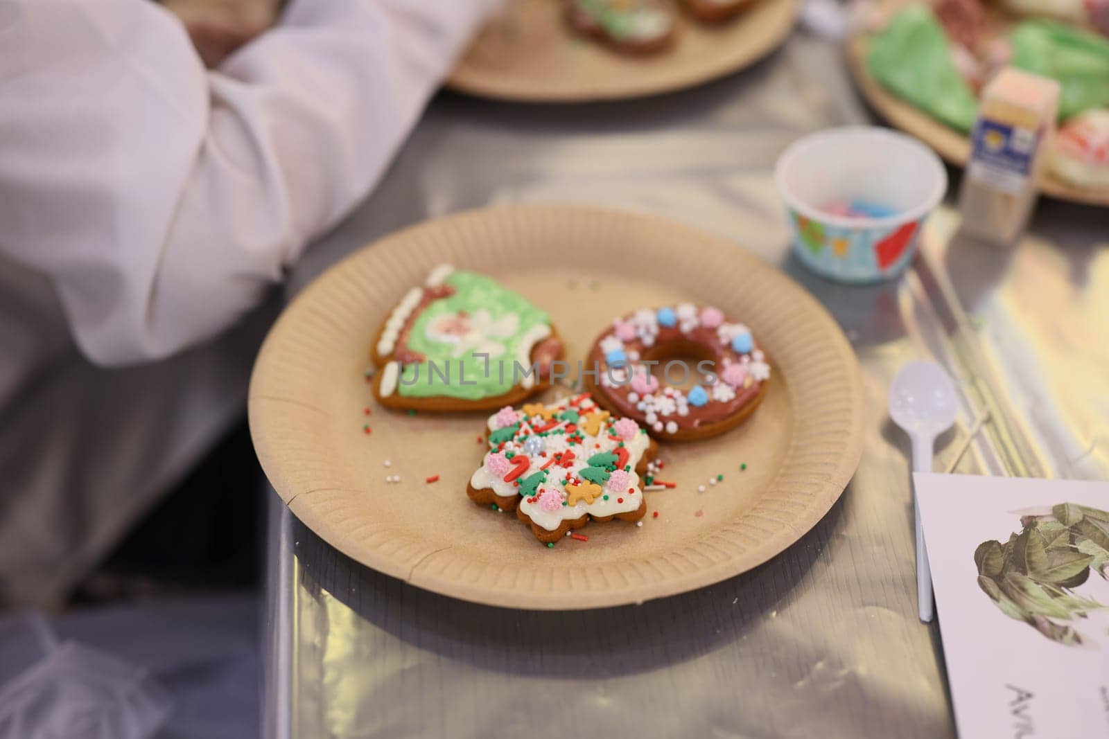 Festively decorated cookies with beautiful, colorful icing and cheerful sprinkles ready for holiday celebrations