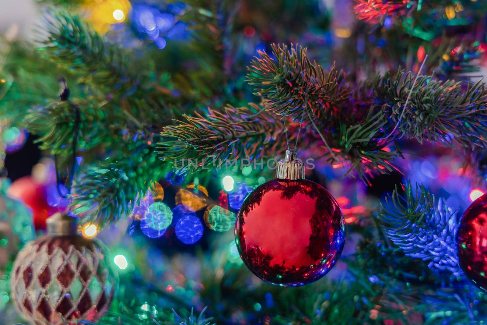 Christmas tree decorated with balls and gerland. High quality photo
