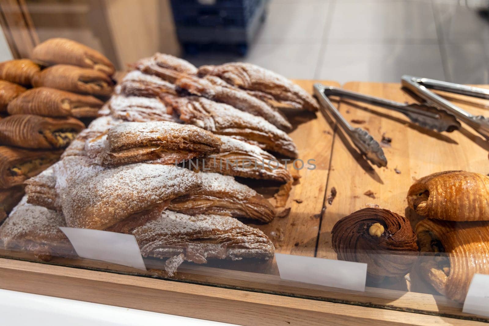 Various assortment of bakery on the counter in a bakery. Paris, France