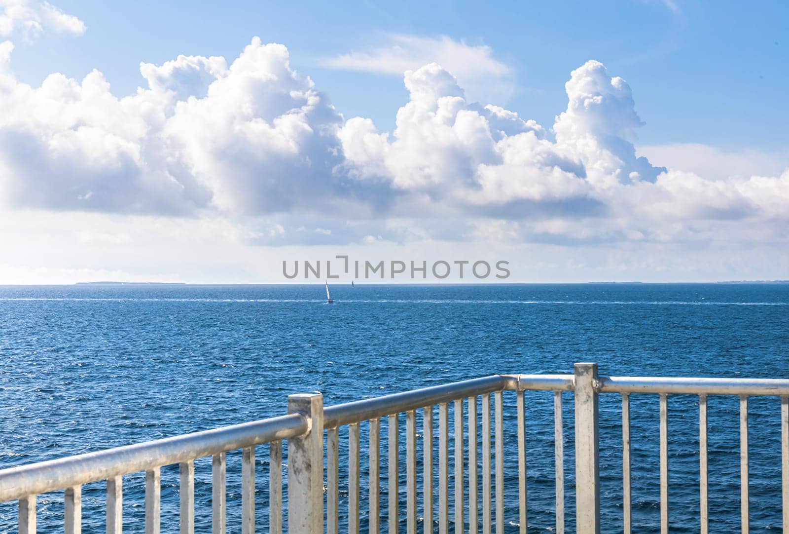Sailbot at sea on a sunny day. Beautiful seascape.